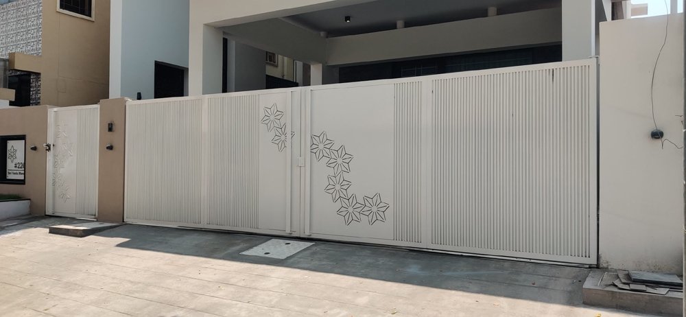 aluminium-bi-folding-gate-flutted-panel-sheet-laser-cutting-automatic-gate.webp